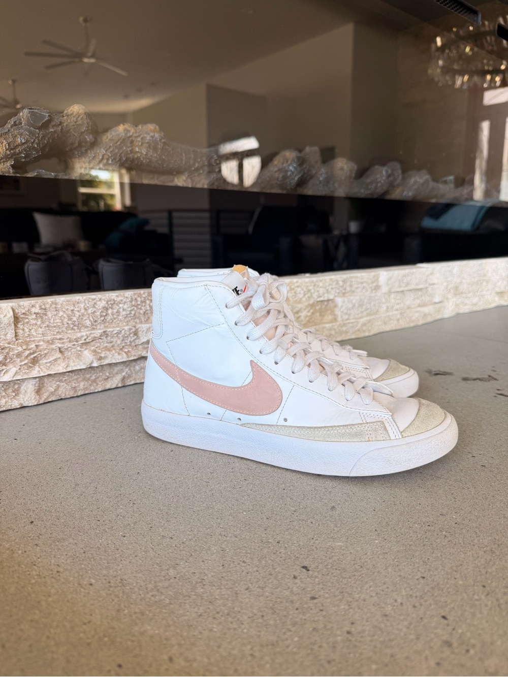 Nike Women’s High-Top Sneakers in White with Pale Pink Swoosh